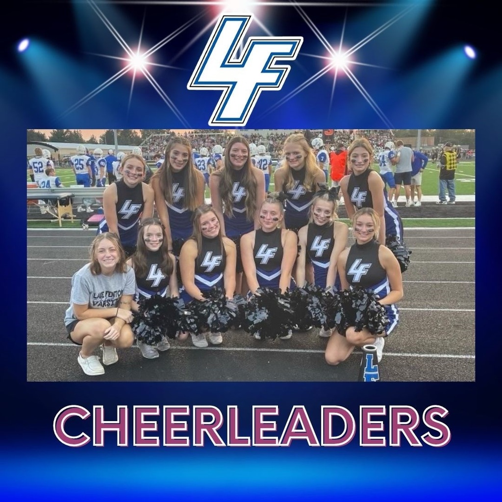 LF cheerleaders posing for a photo on the track at the football field