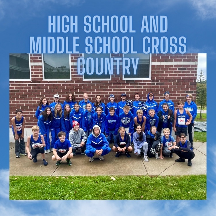 photo of cross country teams from the high school and middle school posing for a team photo 