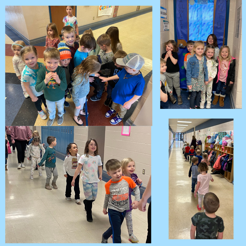 Preschoolers checking out the door decorations
