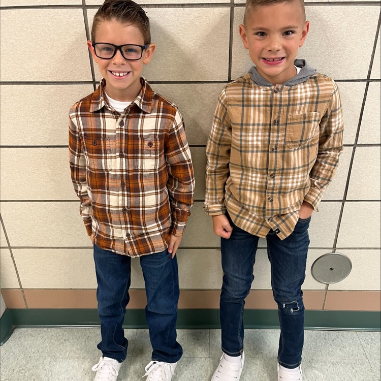 2 boys dressed alike
