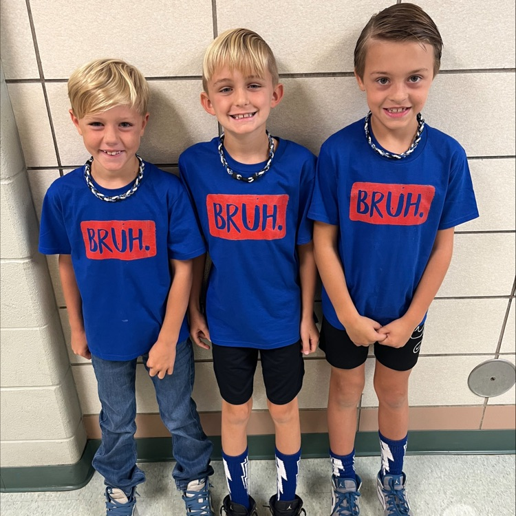 3 boys dressed alike