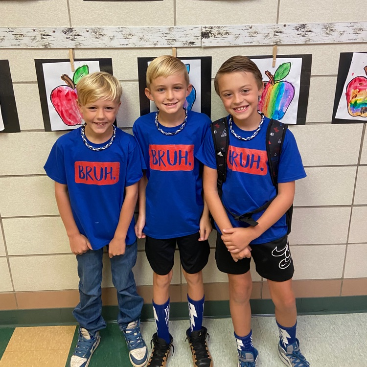 3 boys dressed alike