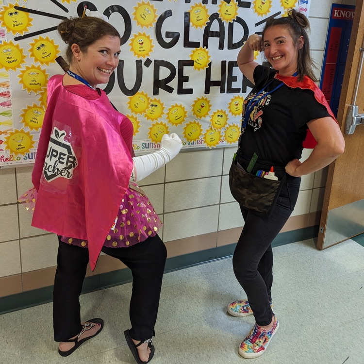 2 teachers dressed like super hero’s 