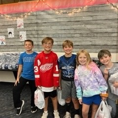 kids smiling in library