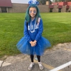 girl dressed in blue spirit wear